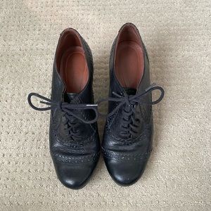Black heeled lace up shoe